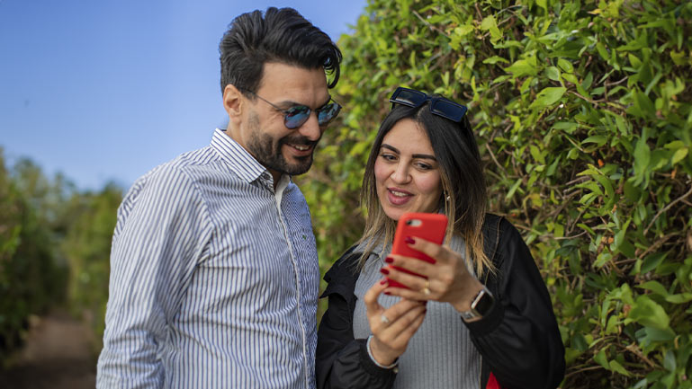 A couple discussing different expressions among cultures