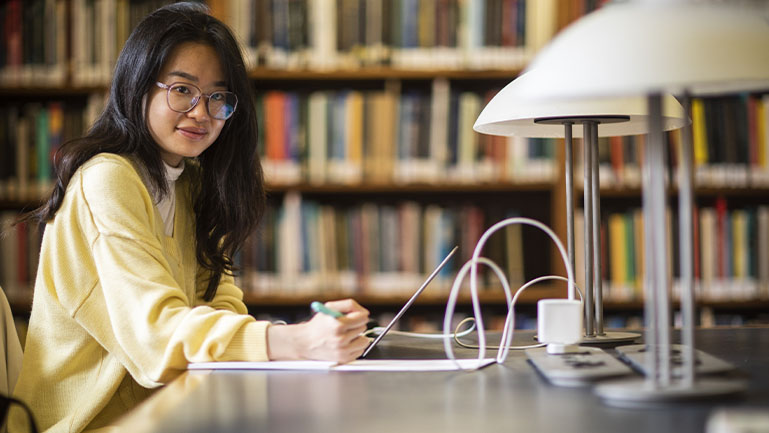 Woman studying grammatical errors